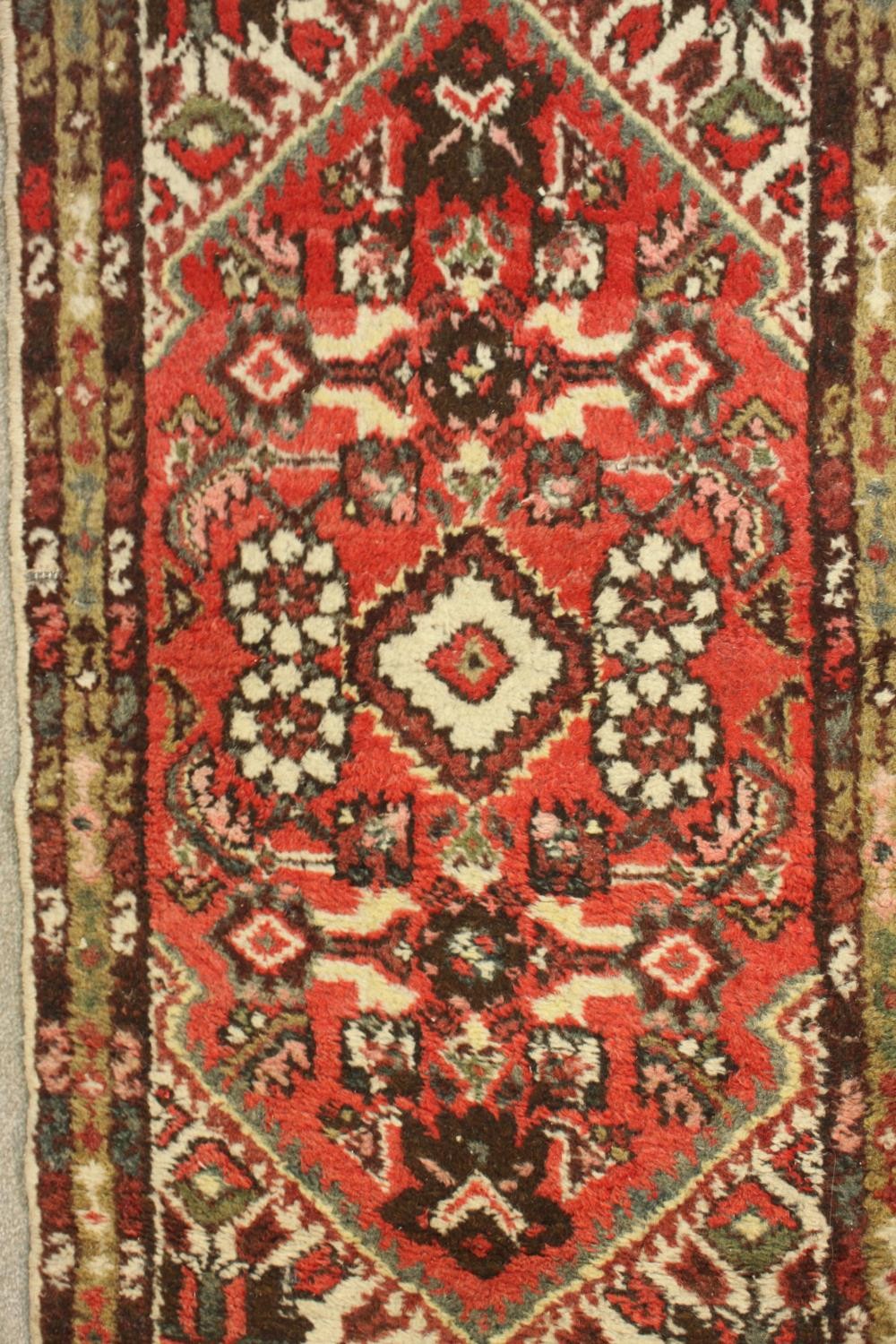 A hand woven red Persian Hamadan with central medallion on burgundy ground within spandrels and - Image 3 of 5