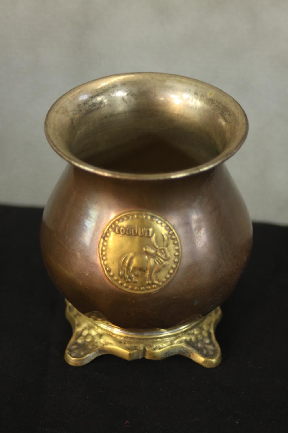 A three piece Indian brass and copper tea set with matching ashtray with relief lion boss detailing. - Image 4 of 12