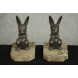 H.Moreau, a pair of Art Deco silvered metal rabbit bookends on marble bases, signed in cast 'H.