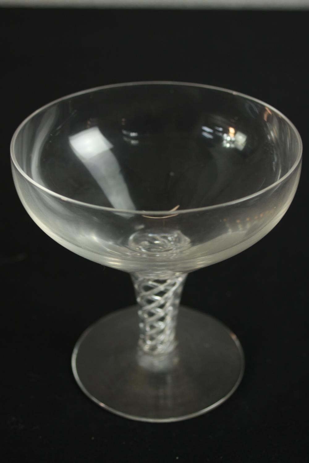 A set of twelve clear glass air twist stem champagne coupes. H.20 Dia.10cm. (largest) - Image 3 of 6