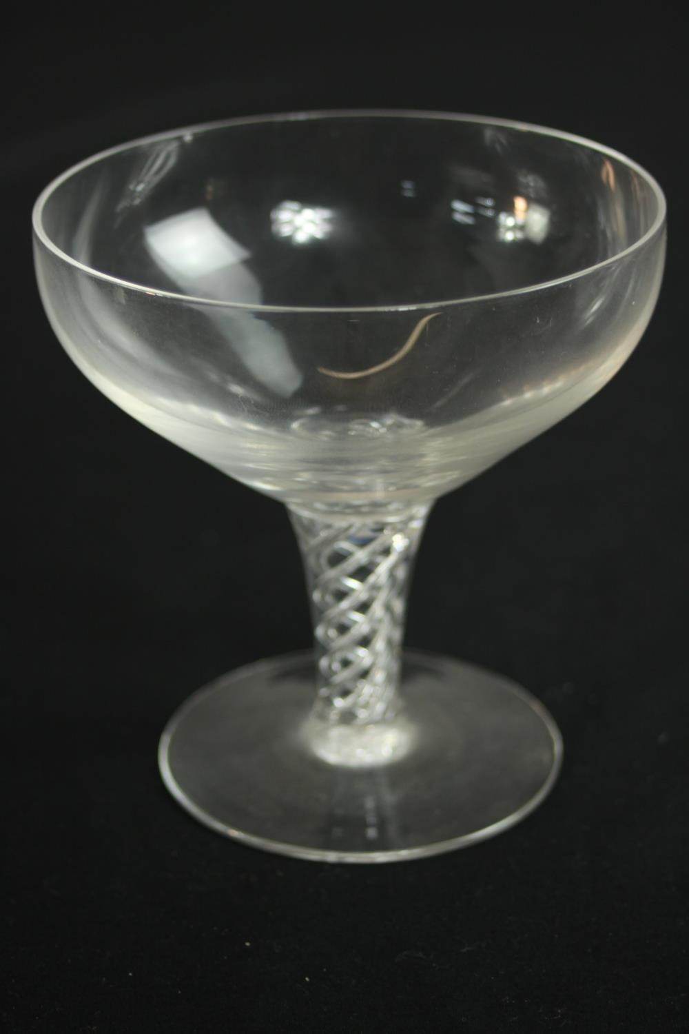 A set of twelve clear glass air twist stem champagne coupes. H.20 Dia.10cm. (largest) - Image 6 of 6