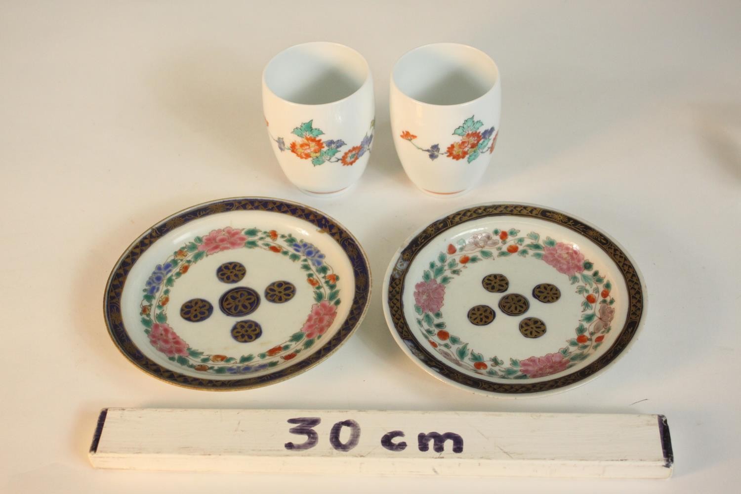 A pair of Japanese Kakiemon floral design porcelain cups, signed to base along with a pair of 19th - Image 2 of 8