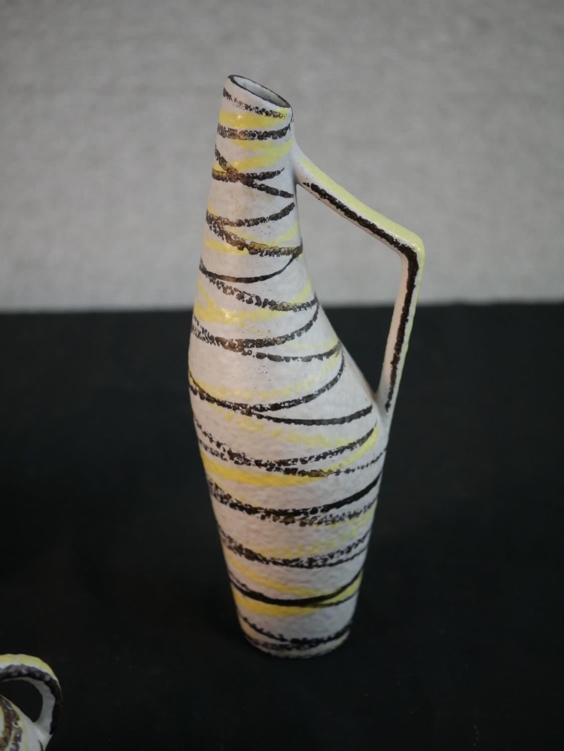 Three mid-century black and yellow abstract linear design handled vases, impressed numbers to - Image 4 of 8