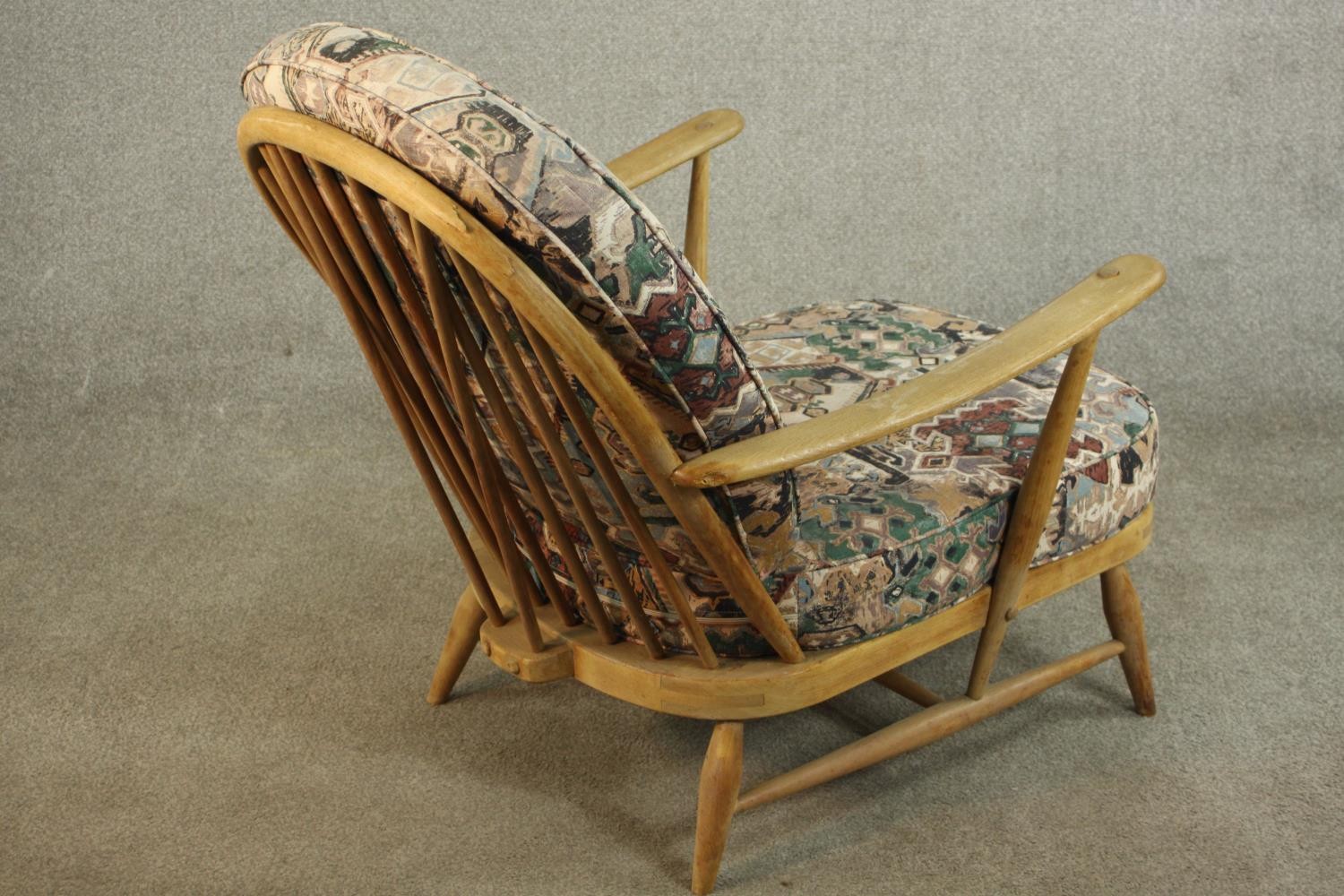 A pair of Ercol elm and beech hoop back armchairs, in Windsor style, with loose back and seat - Image 6 of 11