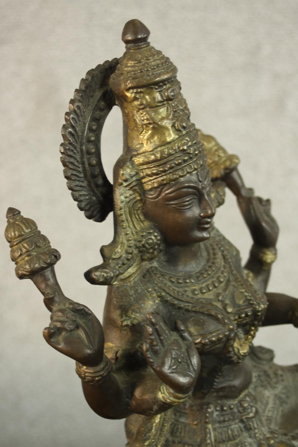 An early 20th century brass figure of the Indian deity Lakshmi on a lotus form base. (Damaged.) H.43 - Image 5 of 9