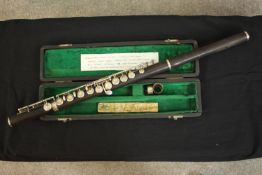 A Cocuswood cylinder bore 'Pratten Perfected' flute with white metal keywork, flute stamped F.