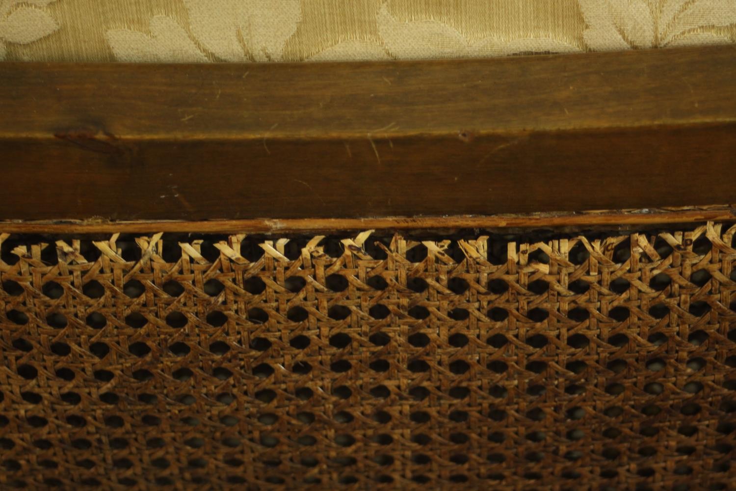 A pair of early 20th century Continental carved walnut bergere armchairs, upholstered in gold - Image 24 of 30