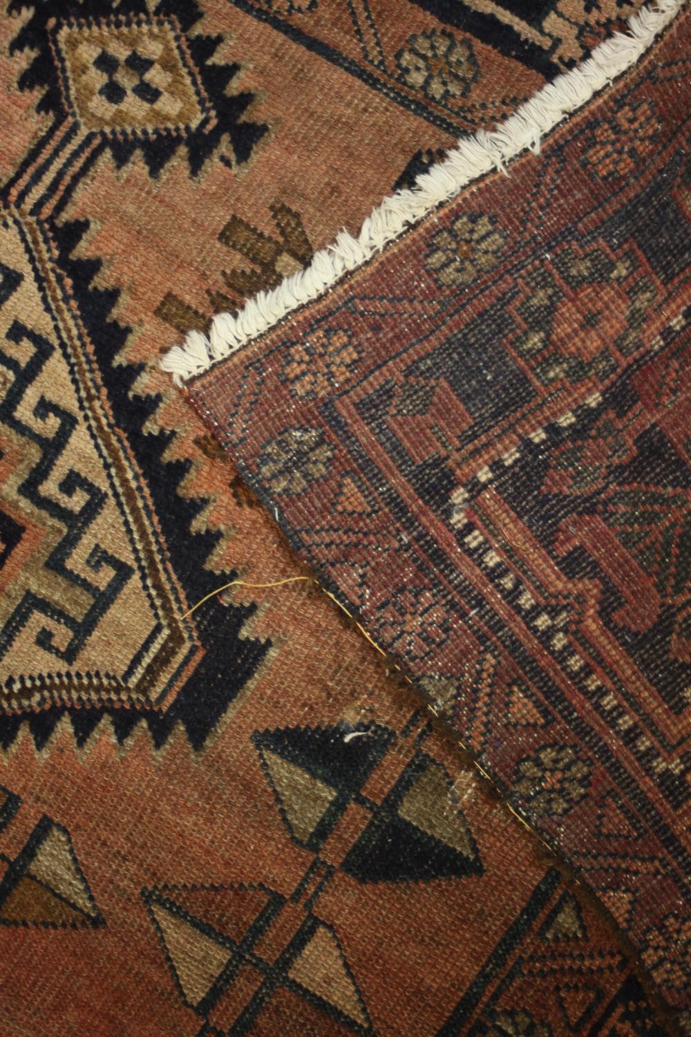 A hand woven Persian Shiraz with triple serrated medallions on a salmon ground within stylised - Image 5 of 6