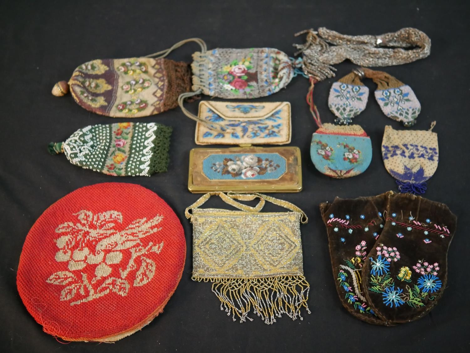 A collection of twelve antique hand beaded and embroidered bags each with a different design and - Image 4 of 9