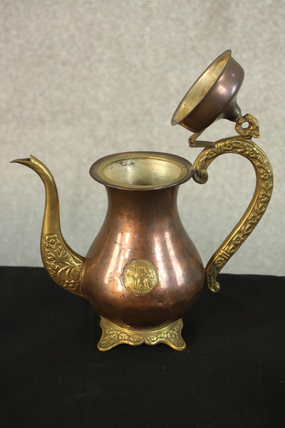 A three piece Indian brass and copper tea set with matching ashtray with relief lion boss detailing. - Image 6 of 12