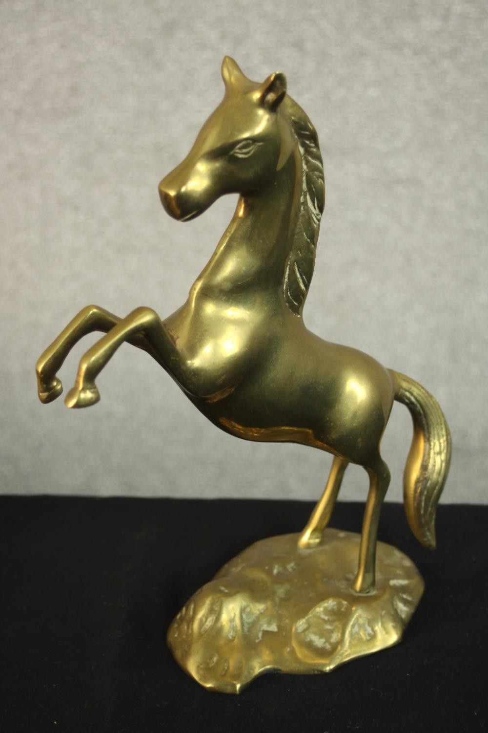An early 20th century copper rearing horse on a mahogany base along with another brass rearing horse - Image 5 of 10