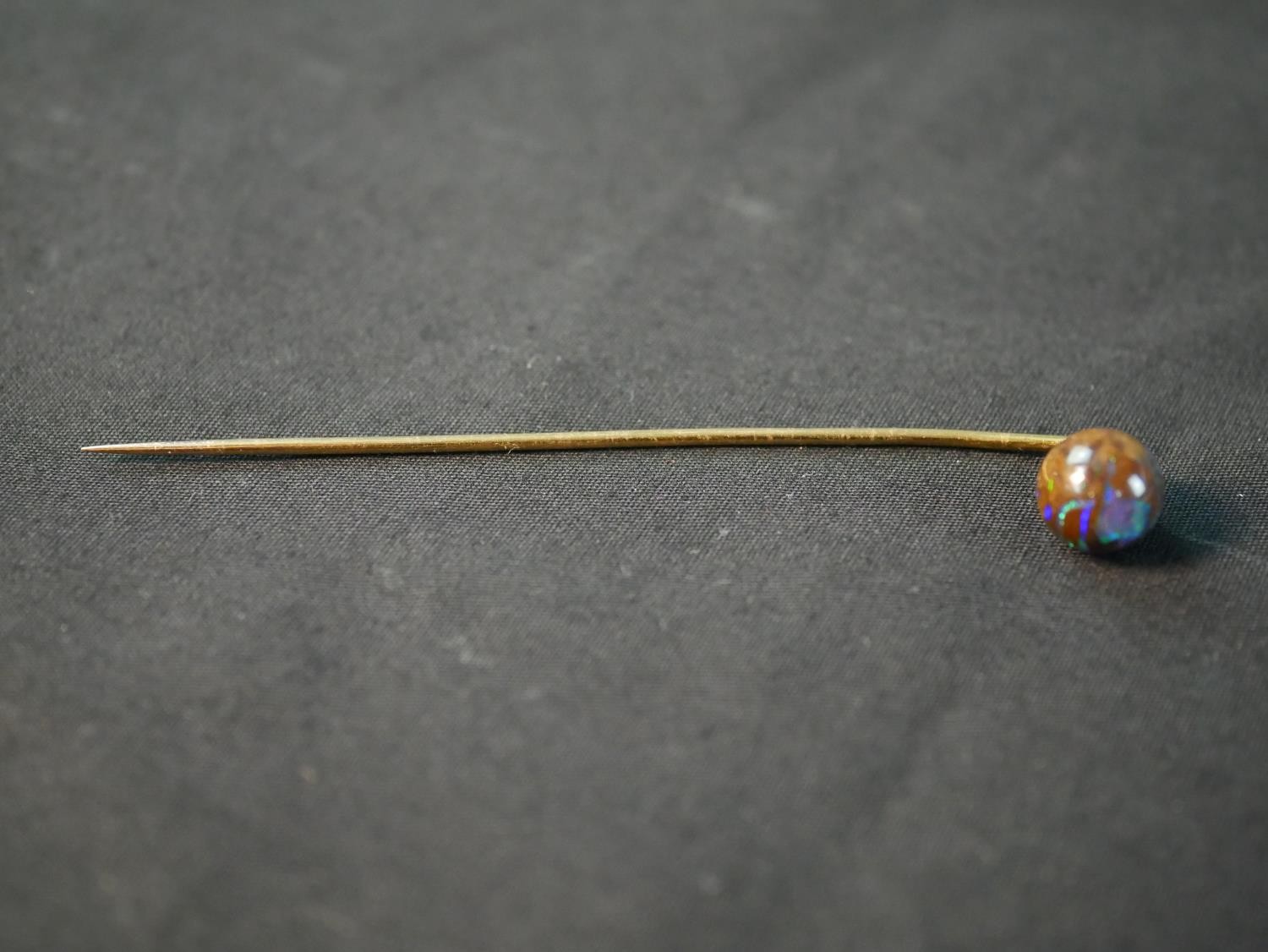 A yellow metal boulder opal stick pin, with carved and polished boulder opal ball to the end (good - Image 2 of 8