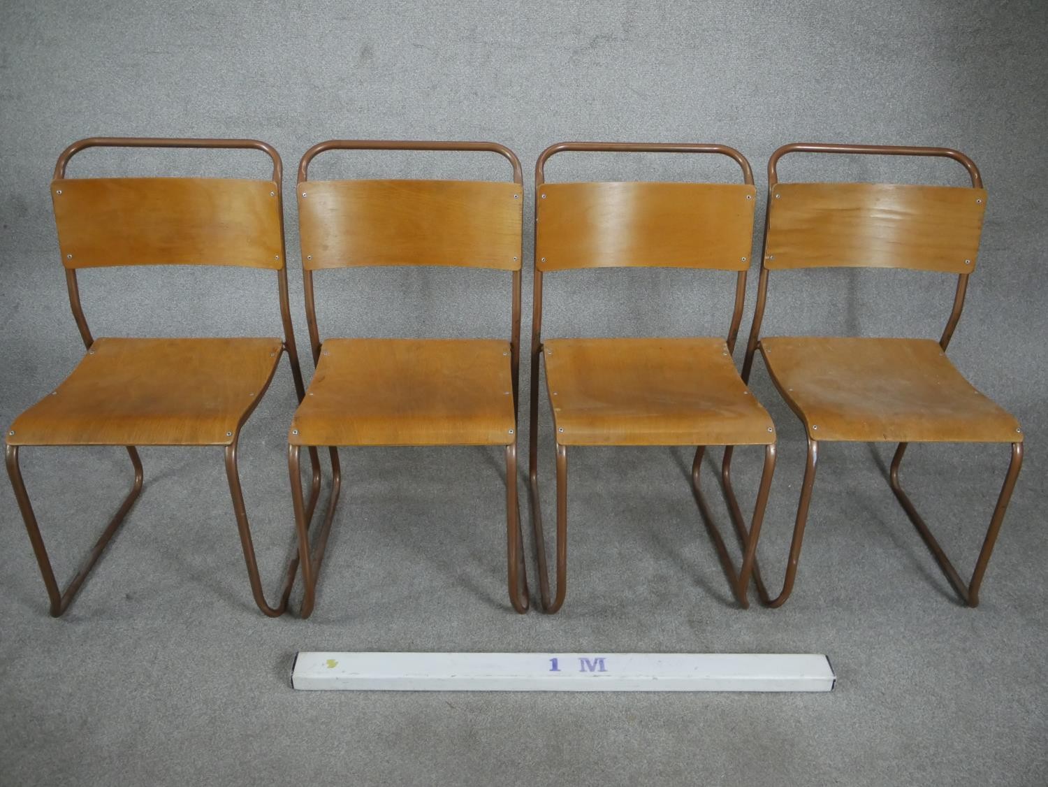 A set of four 1950s Redro plywood stacking school chairs, on brown painted tubular frames. H.84 W.44 - Image 2 of 6