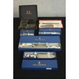 A collection of silver plated cutlery, including boxed Royal Worcester porcelain handled cutlery and