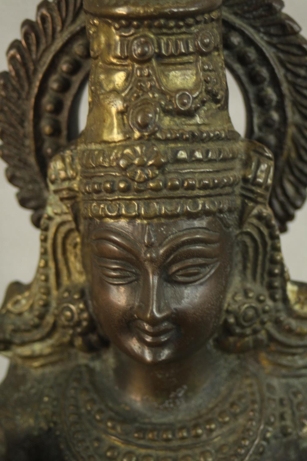 An early 20th century brass figure of the Indian deity Lakshmi on a lotus form base. (Damaged.) H.43 - Image 4 of 9