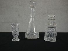 Two cut crystal decanters and a cut crystal vase. etc. H.31 Dia.13cm.