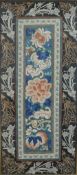 A framed and glazed 19th century Chinese silk embroidery panel, the central section depicting