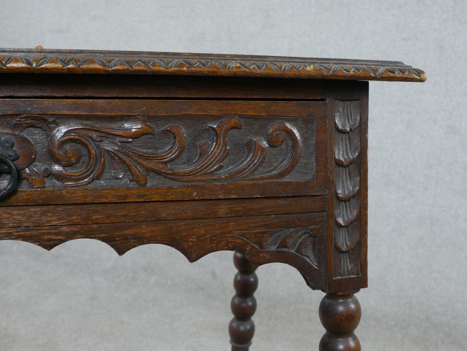 A Victorian carved oak lowboy, the top with a brown leather insert and a carved moulded edge over - Image 8 of 8