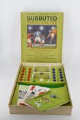 A vintage Subbuteo table football set with box and acrylic pieces. (complete).