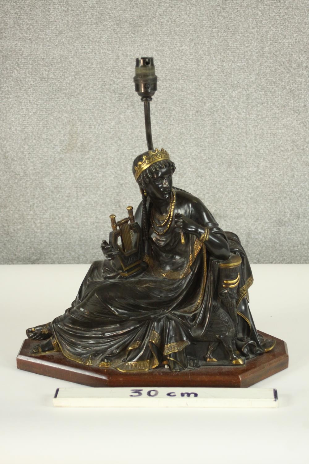 An Egyptian revival gilded bronze figural table lamp depicted as a female in flowing robes holding a - Image 2 of 7