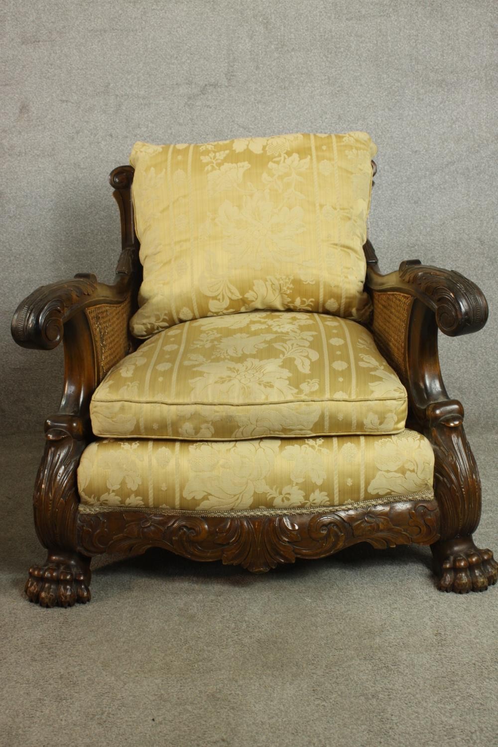 A pair of early 20th century Continental carved walnut bergere armchairs, upholstered in gold - Image 4 of 30