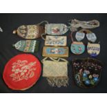 A collection of twelve antique hand beaded and embroidered bags each with a different design and