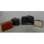 Two vintage Pierre Cardin brown and maroon leatherette suitcases (branded interior) with straps