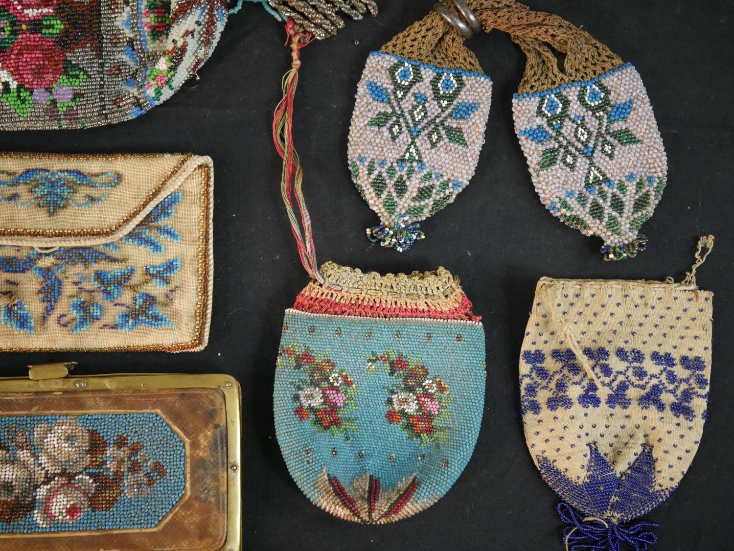 A collection of twelve antique hand beaded and embroidered bags each with a different design and - Image 5 of 9