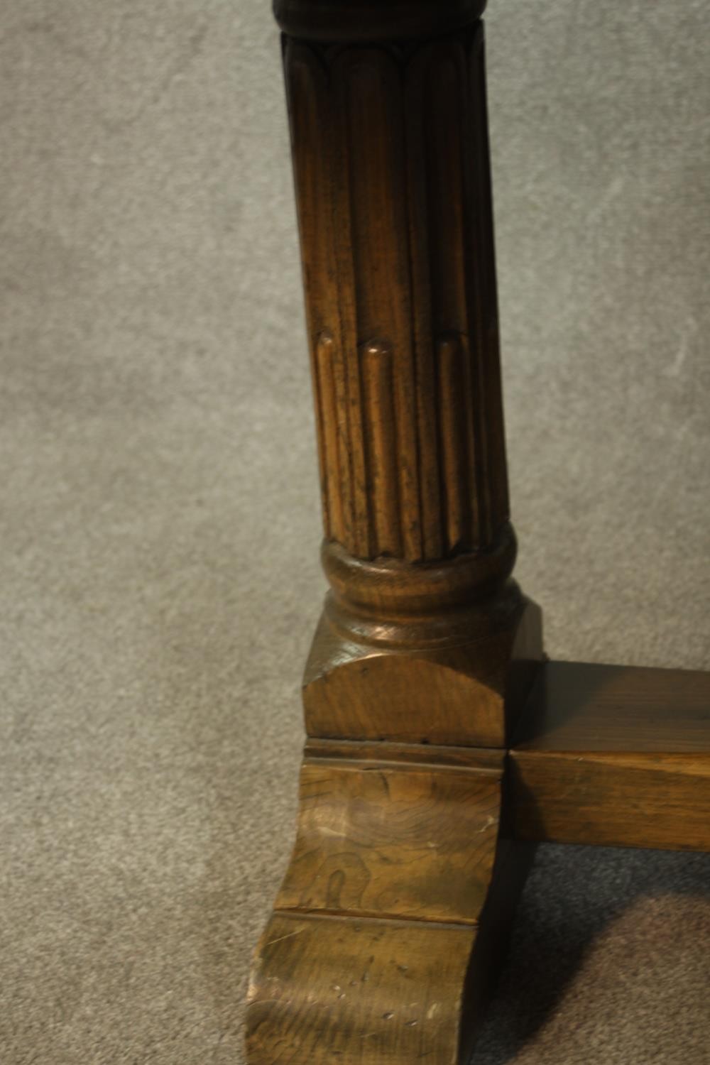 A 20th century oak drop leaf wake table, the oval top with two drop leaves raised on gate legs and - Image 10 of 12