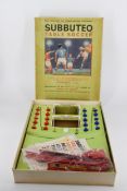 A vintage Subbuteo set with box and acrylic pieces. (complete).