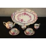 A hand painted Herend porcelain cabaret tea set in the pink Chinese Bouquet pattern, with teapot,