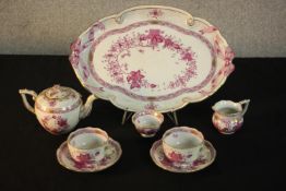 A hand painted Herend porcelain cabaret tea set in the pink Chinese Bouquet pattern, with teapot,