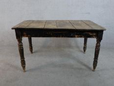 A Victorian painted pine rectangular table, with a plank top on turned legs. H.74 W.138 D.90