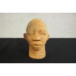 A Yoruba, Nigeria terracotta clay head. H.16 W.11 D 13cm