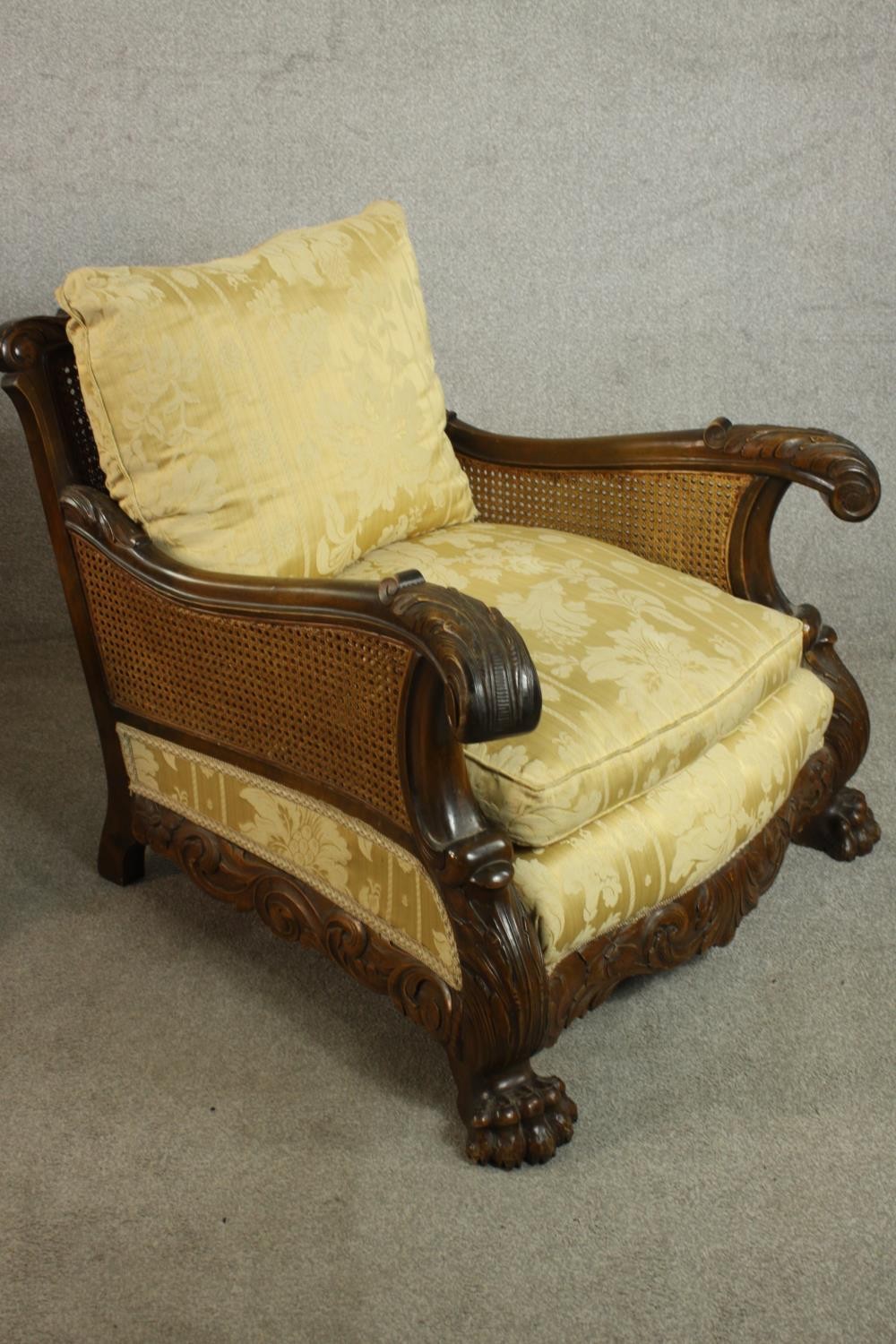 A pair of early 20th century Continental carved walnut bergere armchairs, upholstered in gold - Image 6 of 30