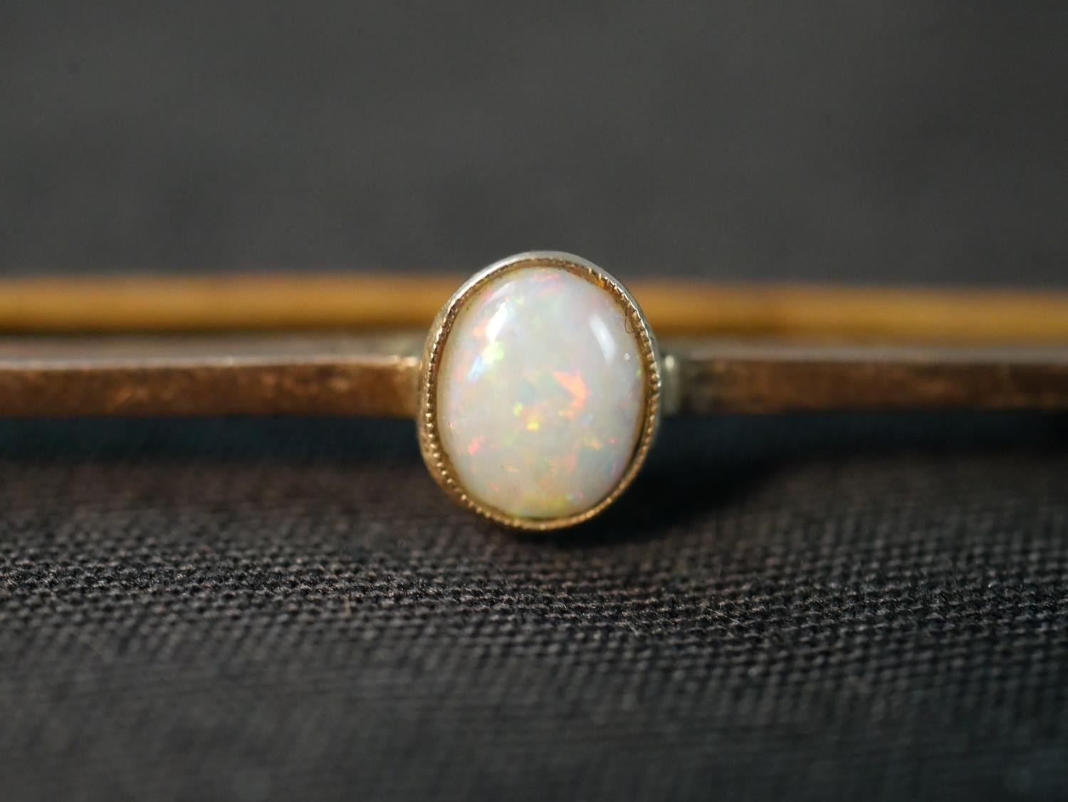 A yellow metal boulder opal stick pin, with carved and polished boulder opal ball to the end (good - Image 6 of 8