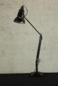 A black enamel Herbert Terry vintage anglepoise desk lamp on square weighted base. H.86 W.15 D.15cm.