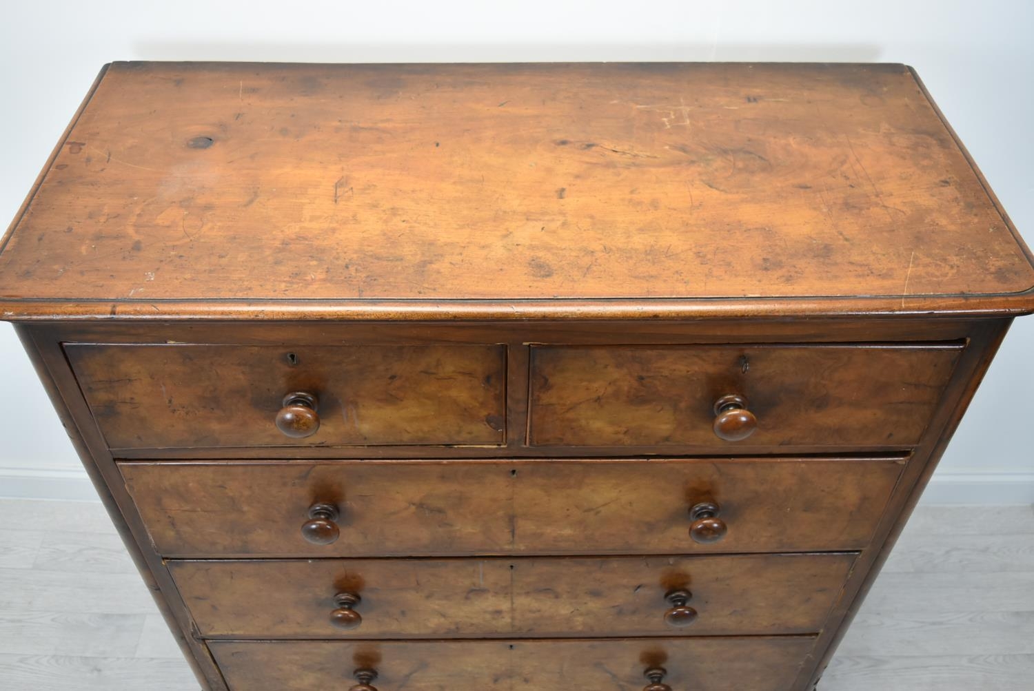 A late Victorian mahogany chest of two short over three long drawers with turned handles raised on - Image 4 of 13