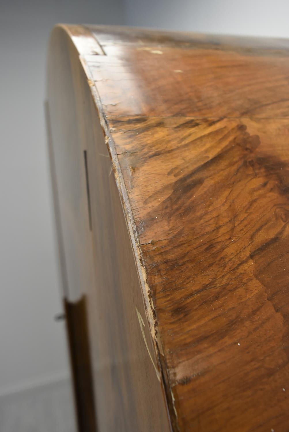 An Art Deco walnut veneered dome topped and twin door wardrobe, opening to reveal mirror, raised - Image 15 of 15