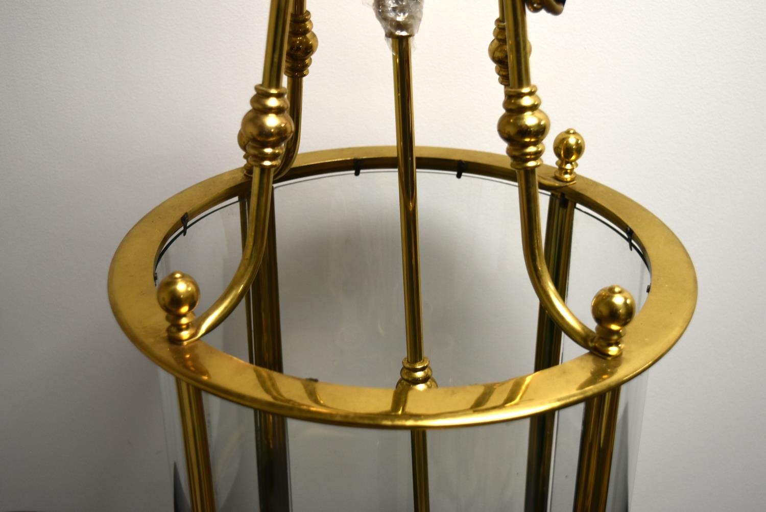 A 20th century brass and glass cylindrical hanging lantern with six branches for lightbulbs. H.82 - Image 5 of 7
