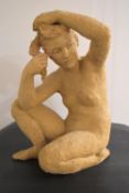 Karen Wilson (Contemporary); a clay fired figure of a crouching nude female, unsigned. H.54 W.40