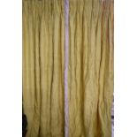 A pair of bright yellow silk pinch pleated interlined curtains. H.318 W.105cm