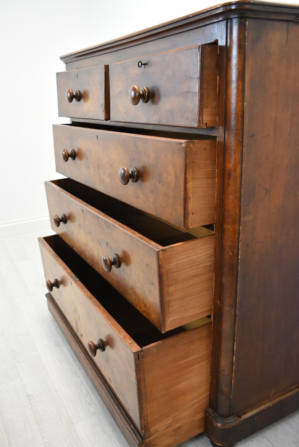 A late Victorian mahogany chest of two short over three long drawers with turned handles raised on - Image 10 of 13