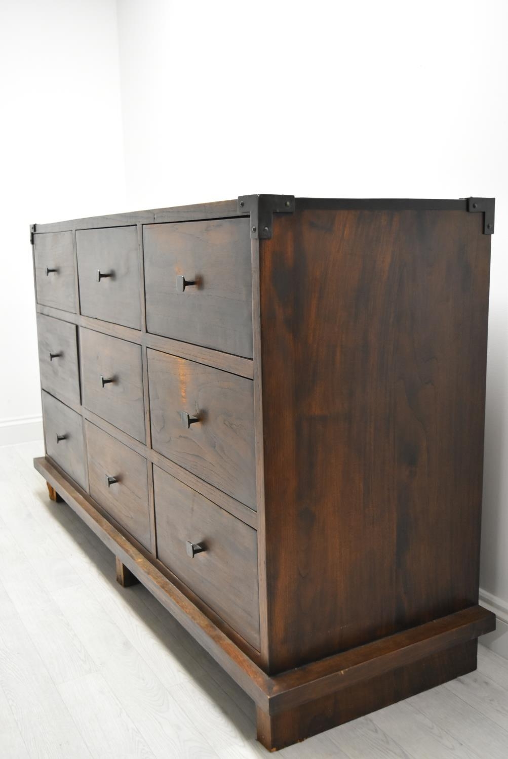 A contemporary Eastern hardwood sideboard with nine drawers raised on short supports. H.100 W.160. - Image 4 of 11