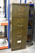 A vintage metal filing cabinet with brass fittings and handles. H.132 x W.46 x D.63cm