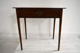 An Edwardian mahogany single drawer hall table raised on square tapering supports. H.76 W.77.5 D.