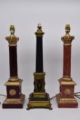 A matched pair of marble column table lamps with applied gilt metal mounts raised on square bases,