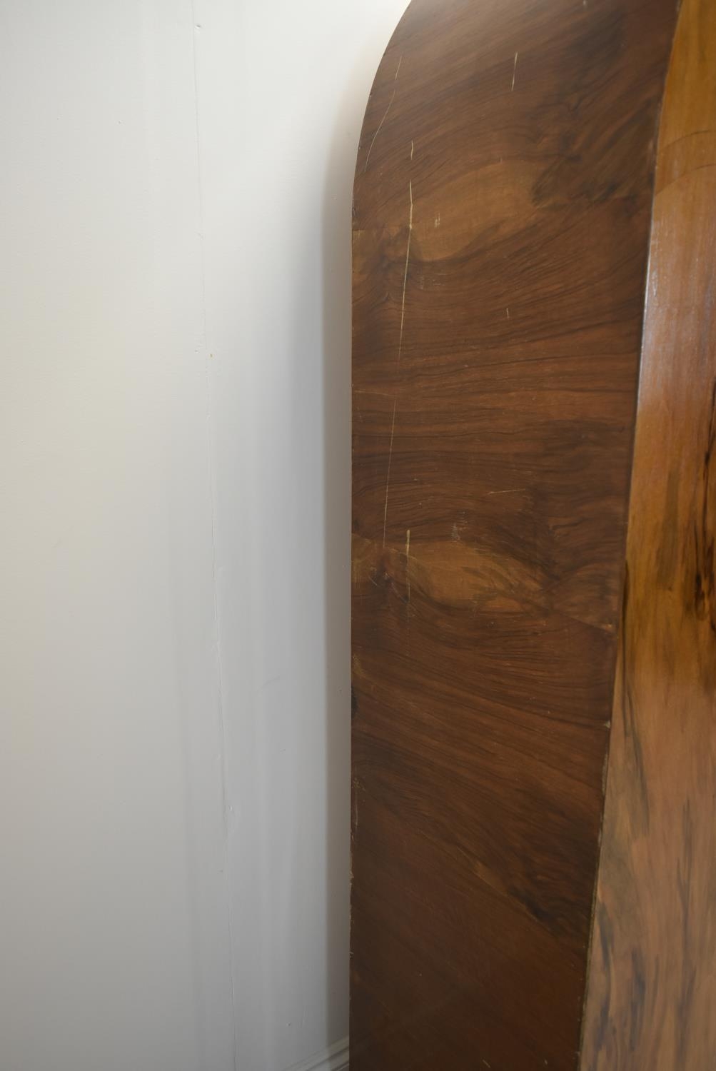 An Art Deco walnut veneered dome topped and twin door wardrobe, opening to reveal mirror, raised - Image 8 of 15