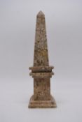 A 19th / early 20th century marble obelisk raised on plinth base. H.37 W.10 D.10cm