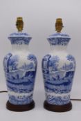 Two blue and white Spode Italian pottery table lamps, raised on circular plinth bases. H.38.5cm